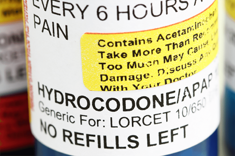Close-up of a Hydrocodone/APAP prescription bottle label marked 'No Refills Left'