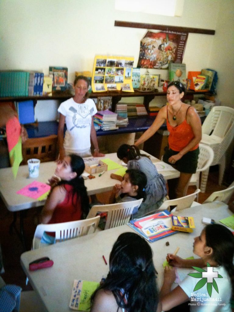  Michelle Gregg (white shirt) teaching local children