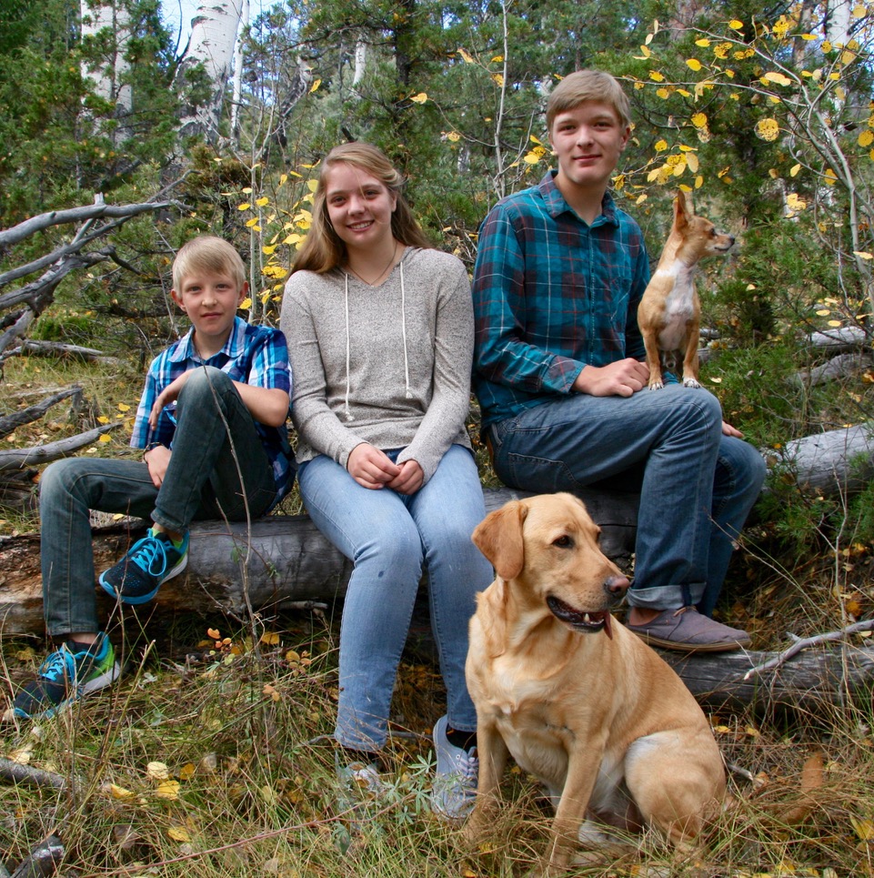 group photo of Klug family with their pets