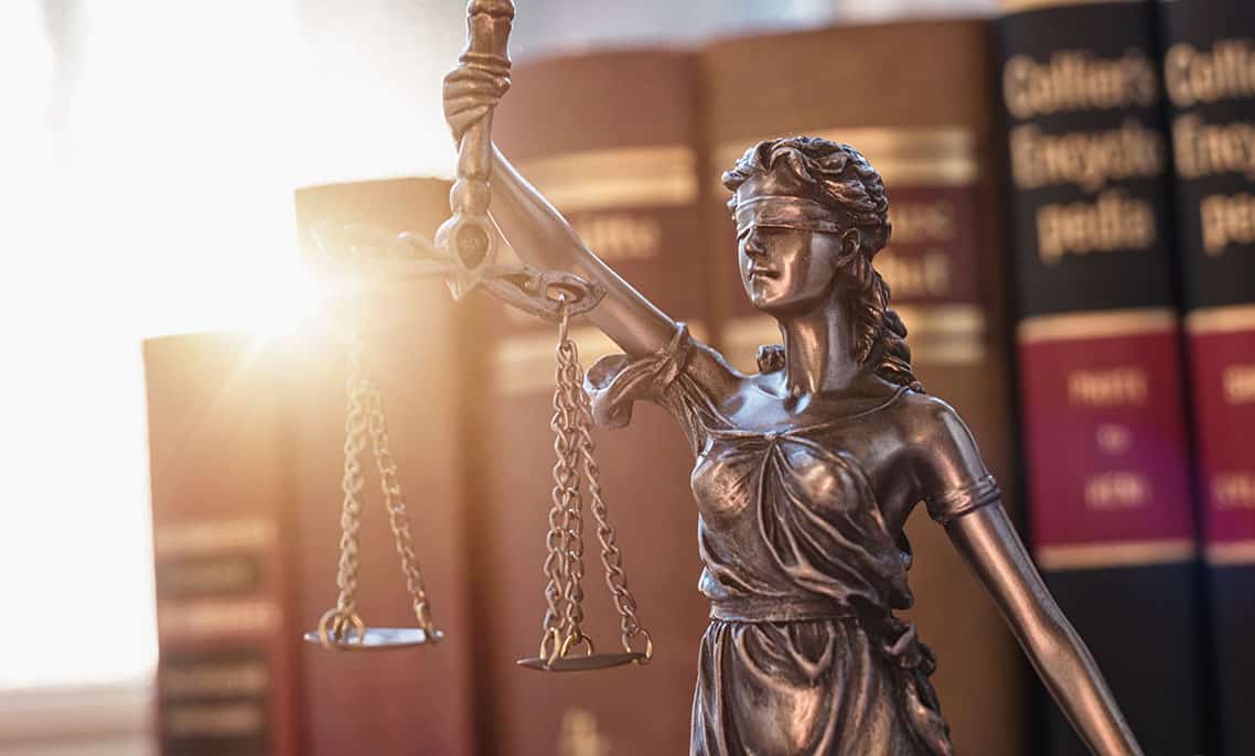 Statue of Lady Justice holding scales